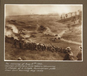 ThemorningofAug.8th1918.Germanprisonersjusttaken,returninginchargeofasingleAustralianpasttheirownburningdug-outs_id_3007145371_PD